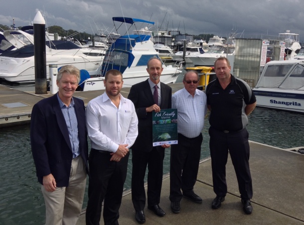 Chris Cleaver with his recently caught and released hybrid cod he likes to call a Murrout (cross between a Murray and trout cod).